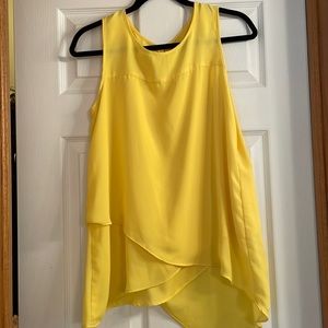 Yellow sleeveless high low top